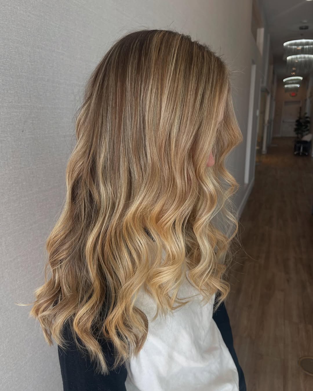 Rich Dirty Blonde Color Melt Long Layers