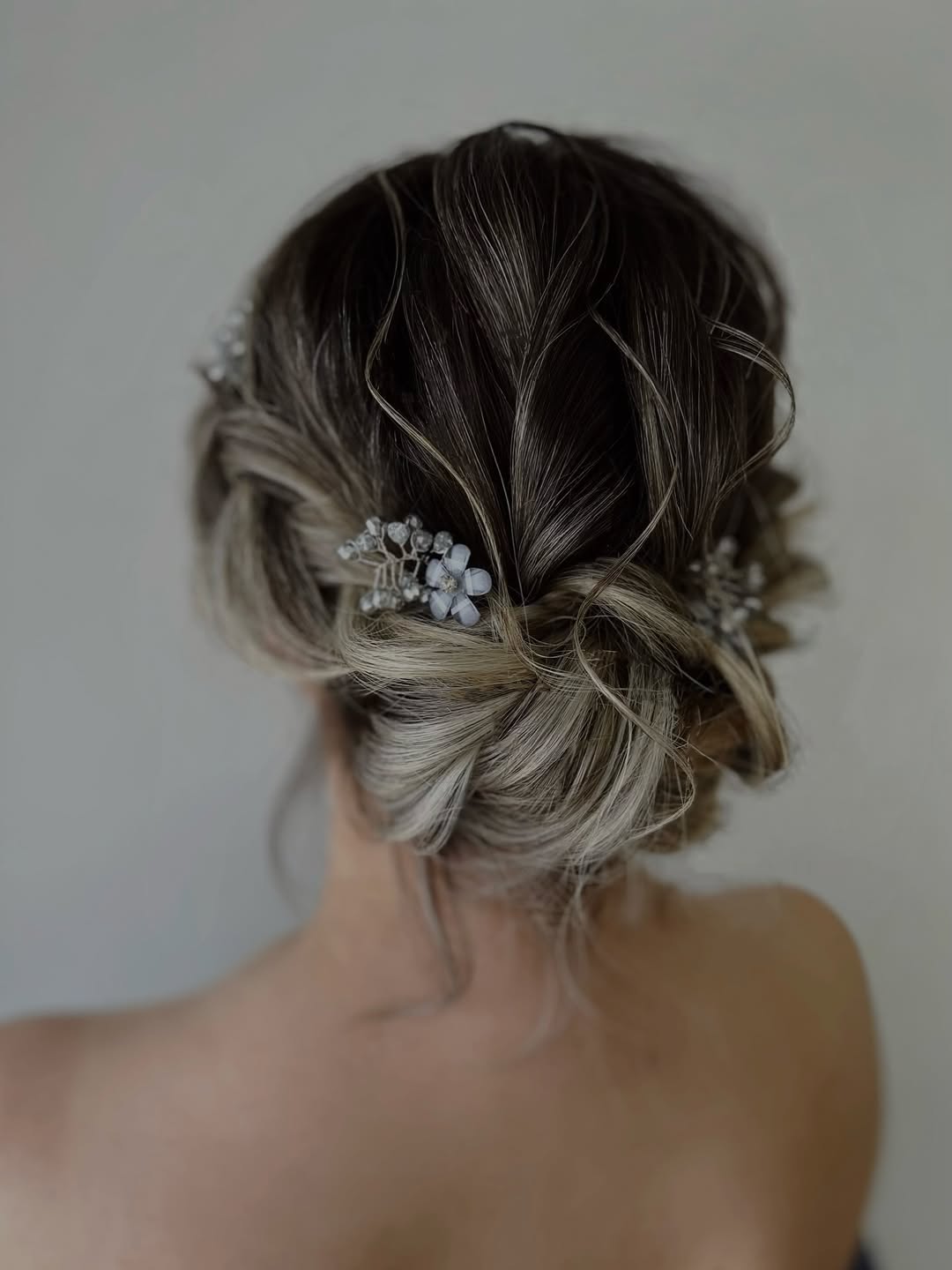 Romantic Braided Updo With Crown Twists And Pearls