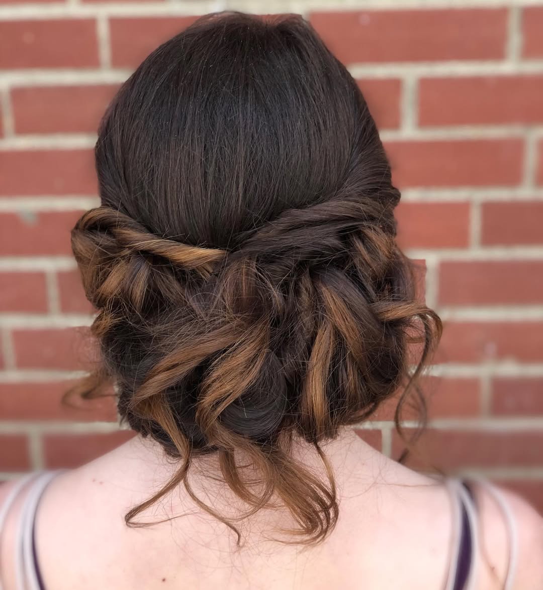 Romantic Braided Updo With Loose Curls