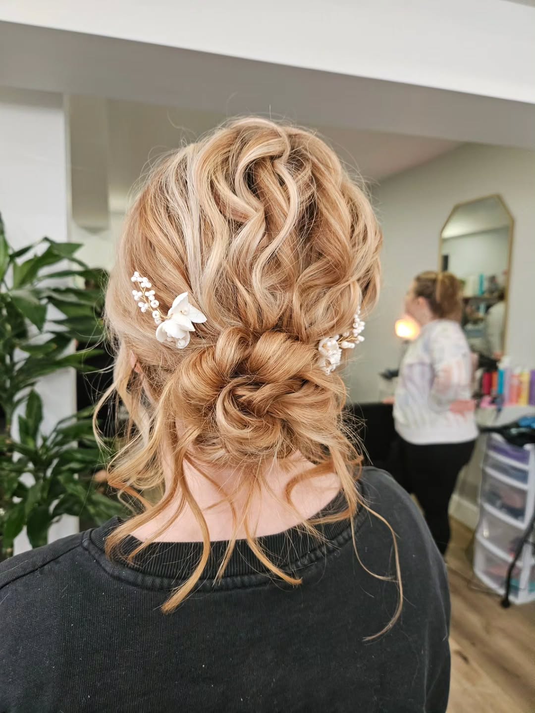 Romantic Braided Updo With Loose Tendrils