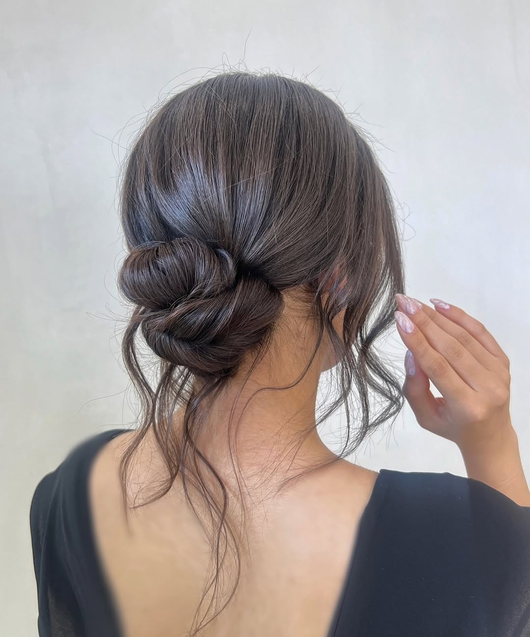 Romantic Chignon With Wispy Tendrils
