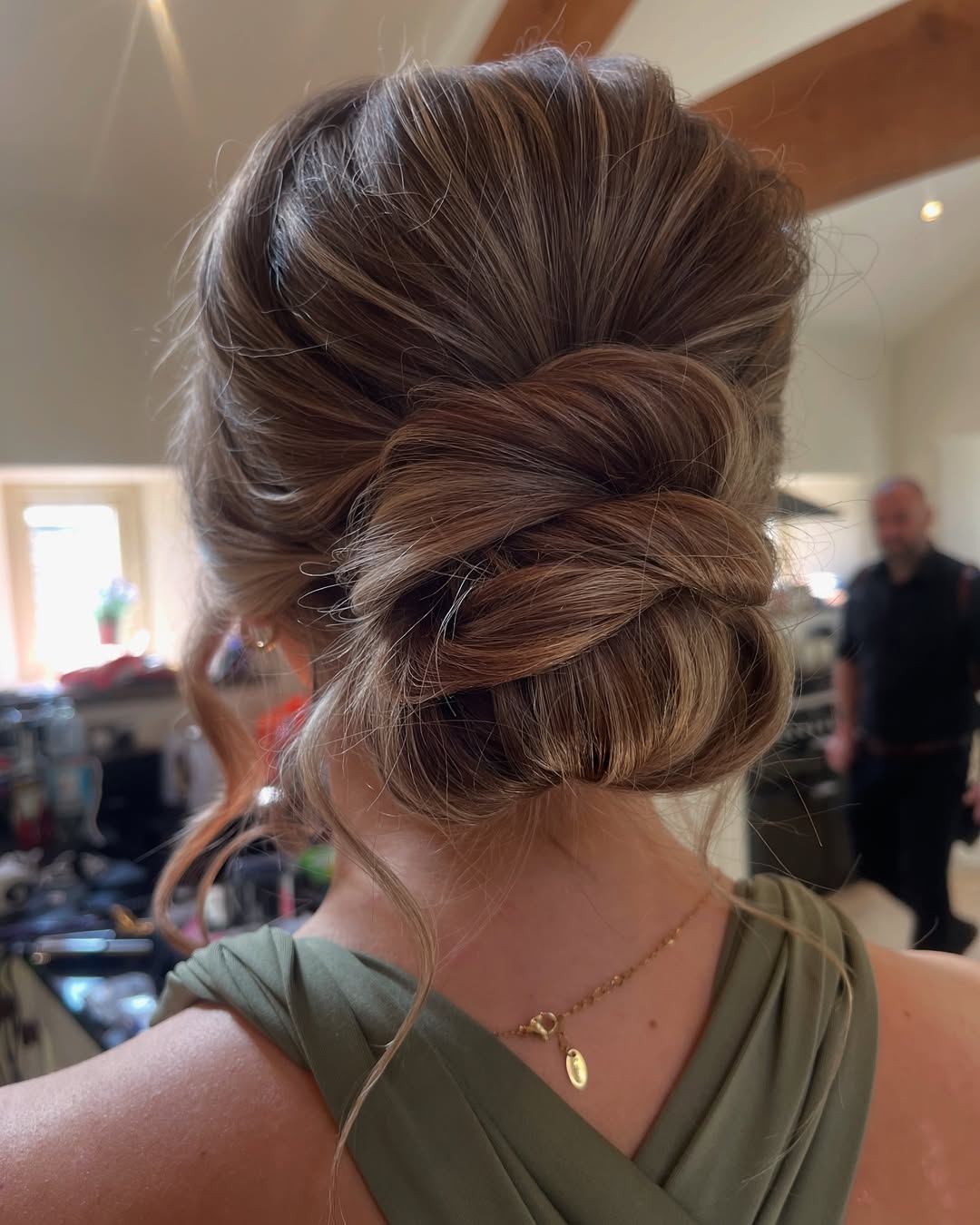 Romantic Twisted Updo With Face-Framing Tendrils