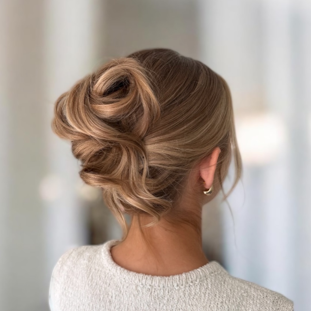 Romantic Twisted Updo With Loose Tendrils