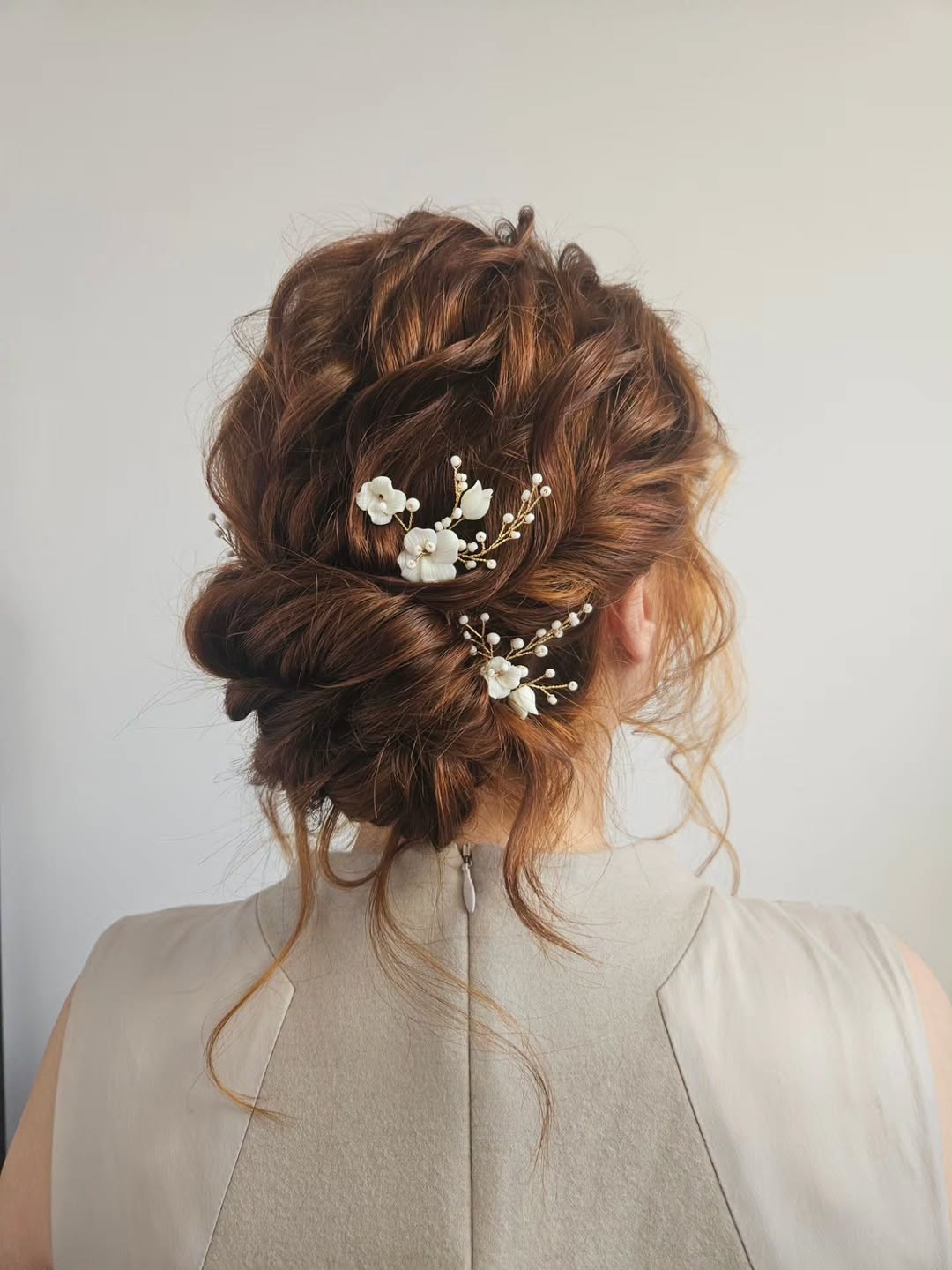 Romantic Updo With Delicate Floral Hair Pins