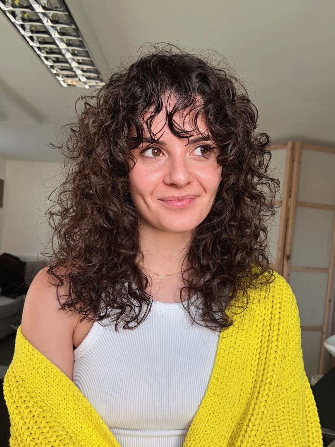 Shaggy Curly Cut With Wispy Bangs
