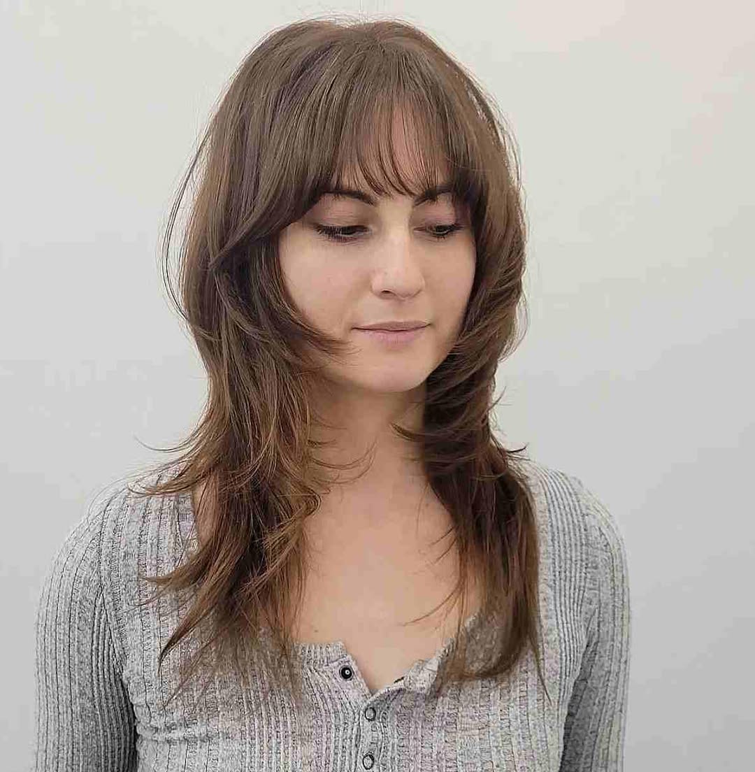 Shaggy Layers With Face-Framing Bangs