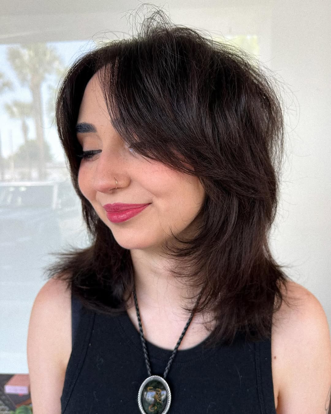 Shaggy Layers With Voluminous Curtain Bangs