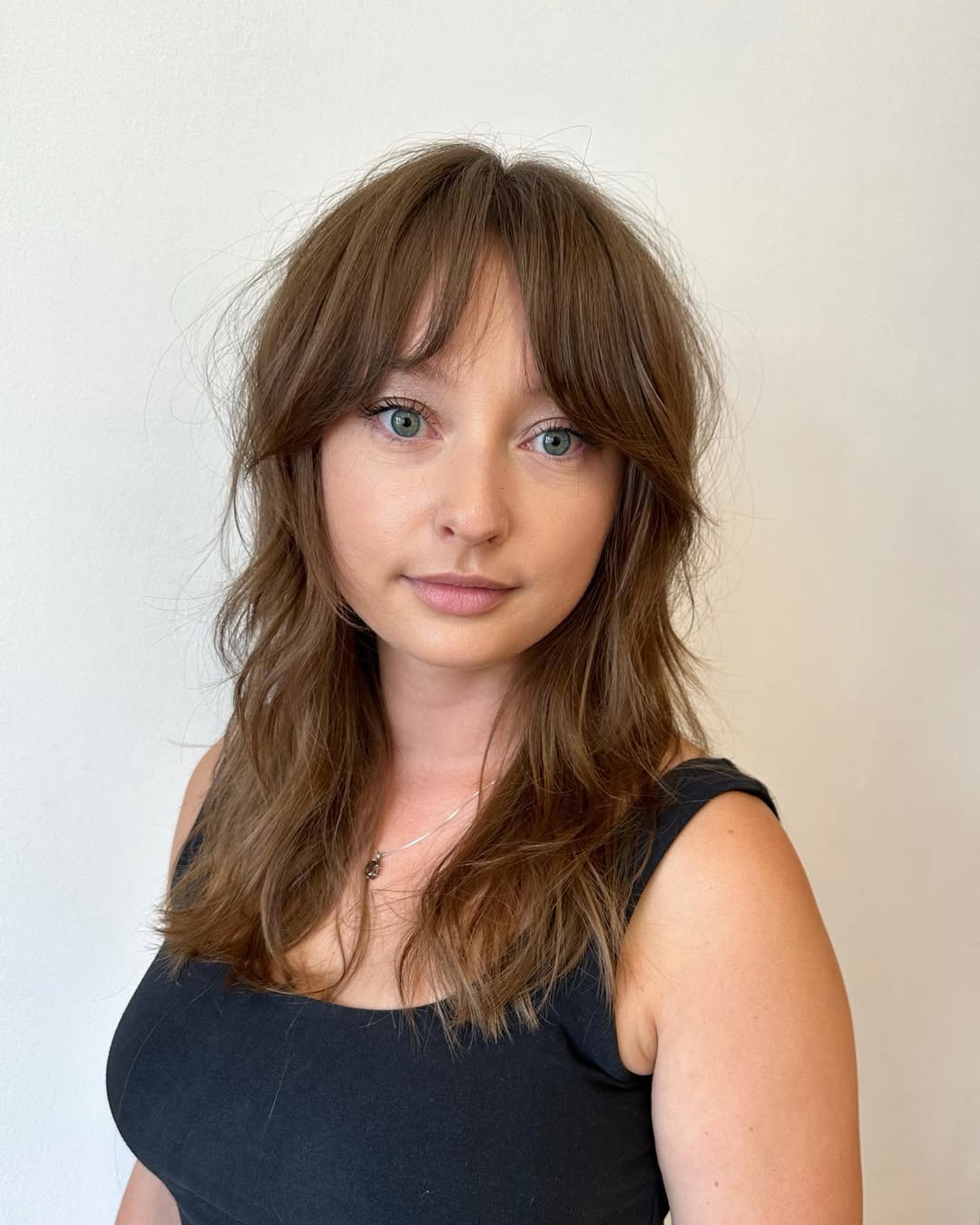 Shaggy Layers With Wispy Curtain Bangs