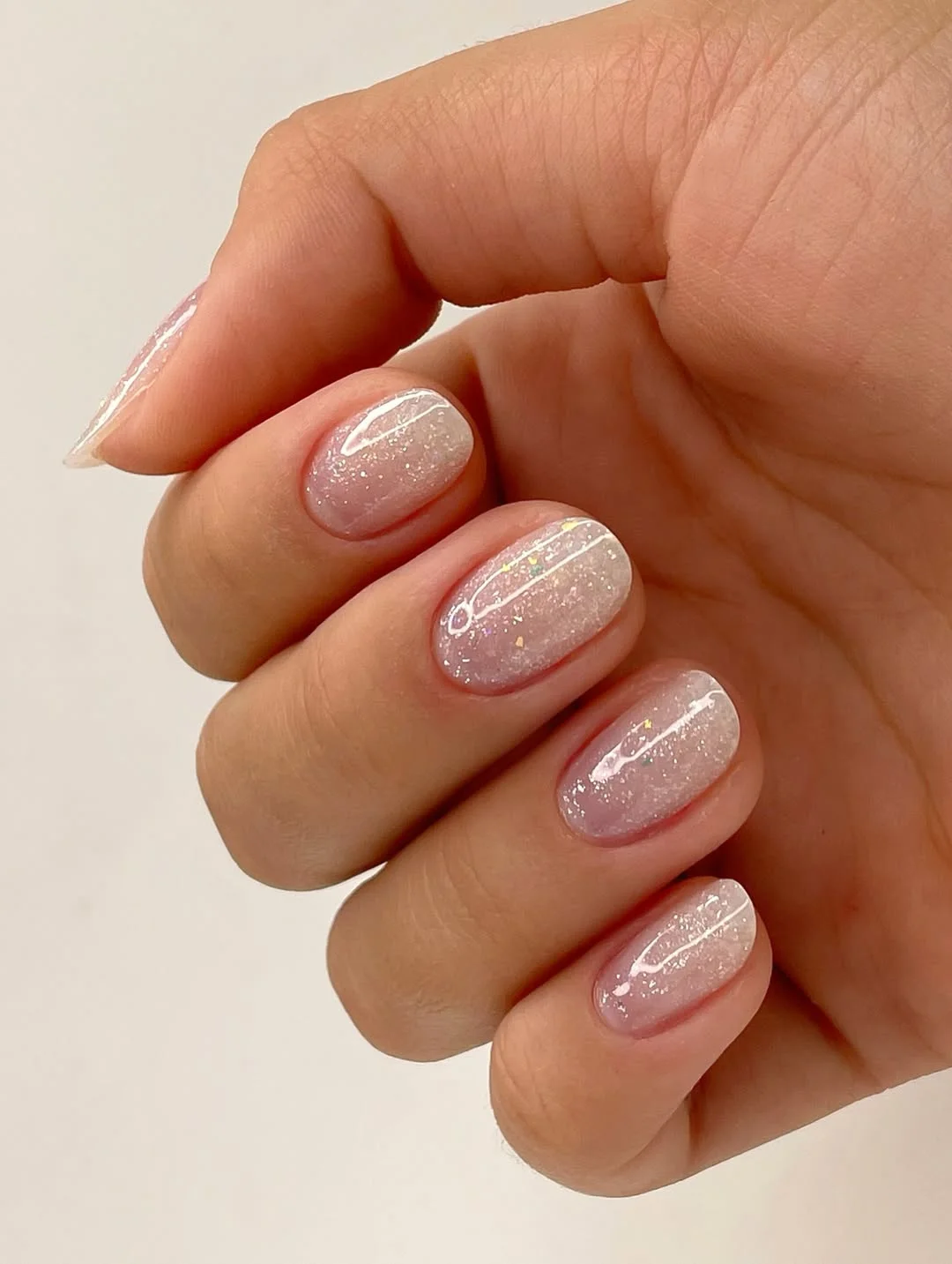 Shimmering White Pearl Glitter Oval Nails