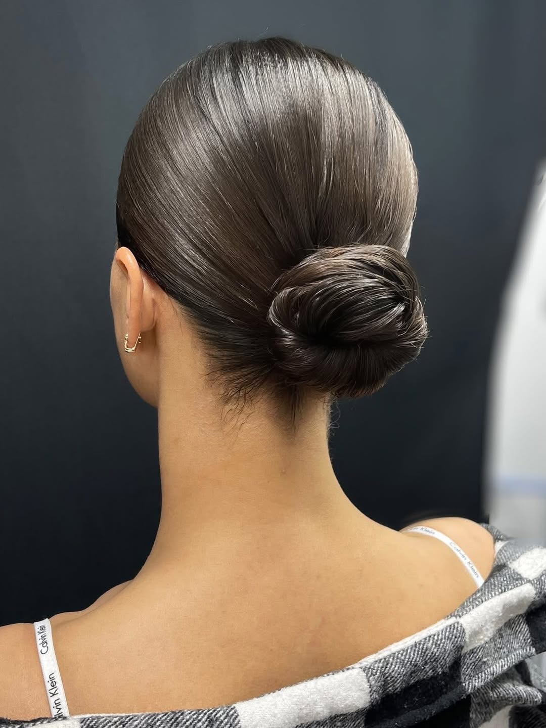 Sleek Ballerina Bun With Glossy Finish