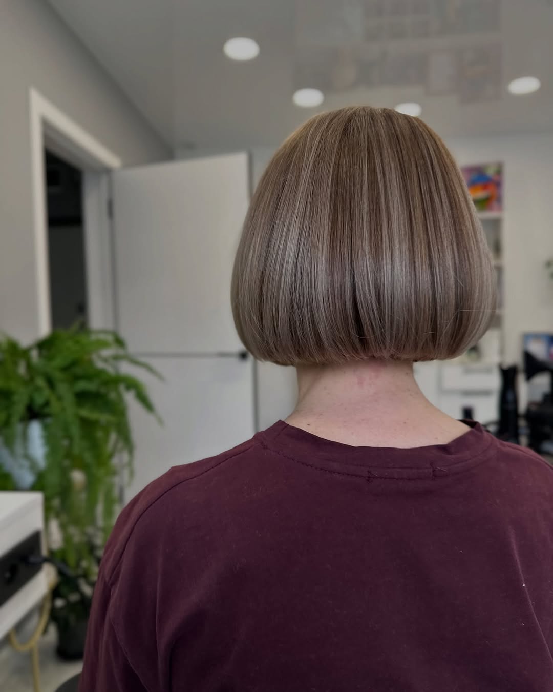 Sleek Chin Length Bob With Ash Blonde Highlights