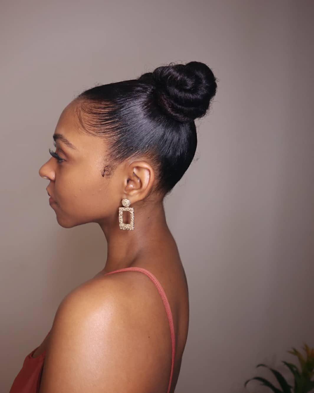 Sleek High Bun With Laid Edges