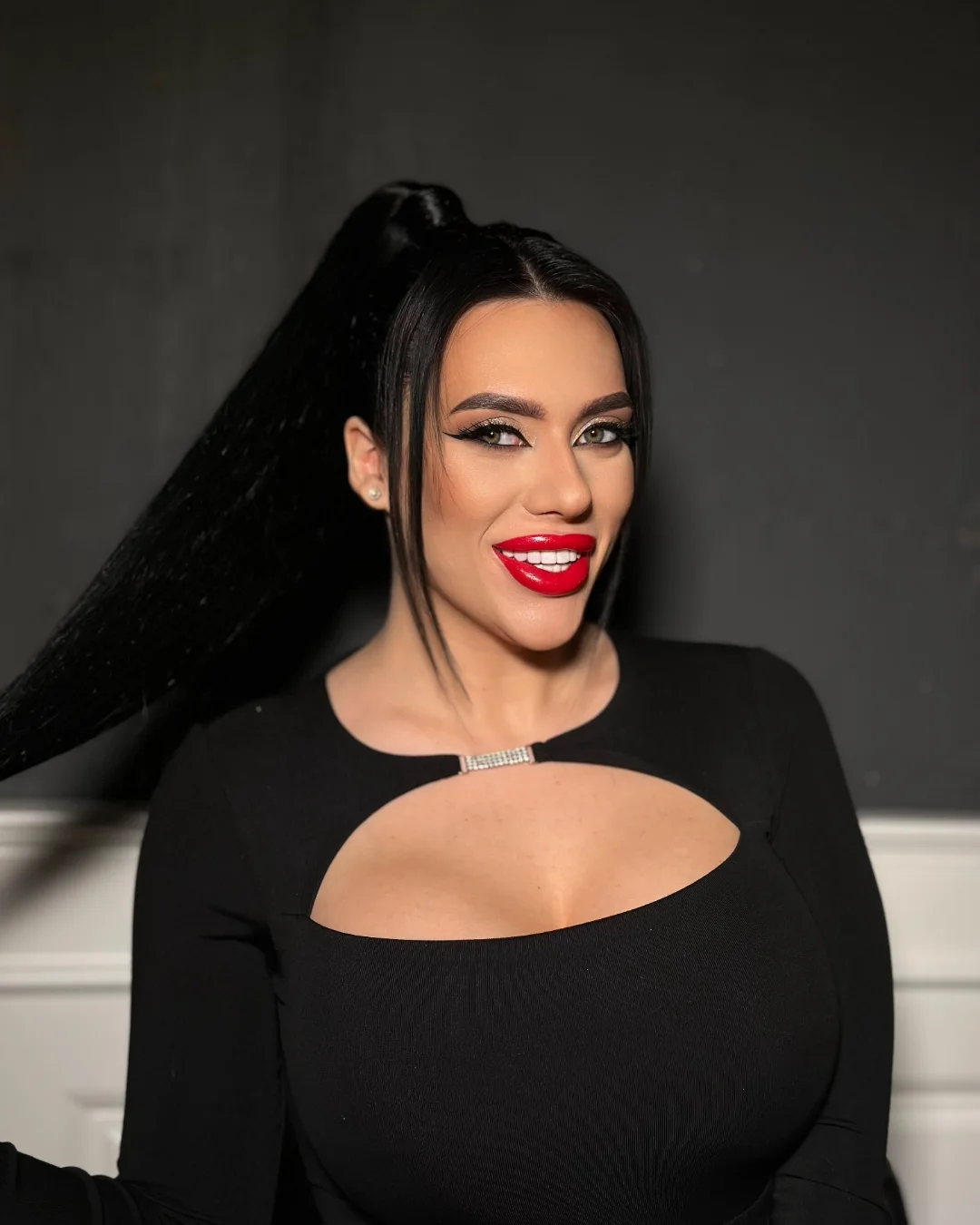 Sleek High Ponytail With Face Framing Strands