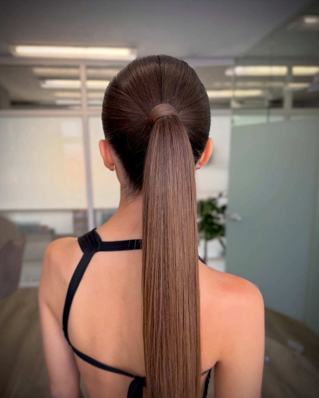 Sleek High Ponytail With Hair-Wrapped Base