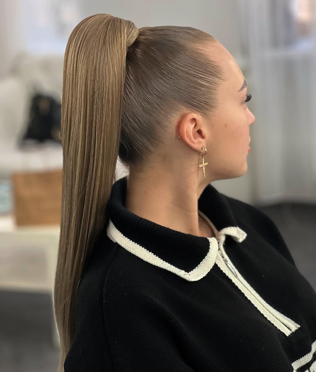 Sleek High Ponytail With Honey Blonde Highlights