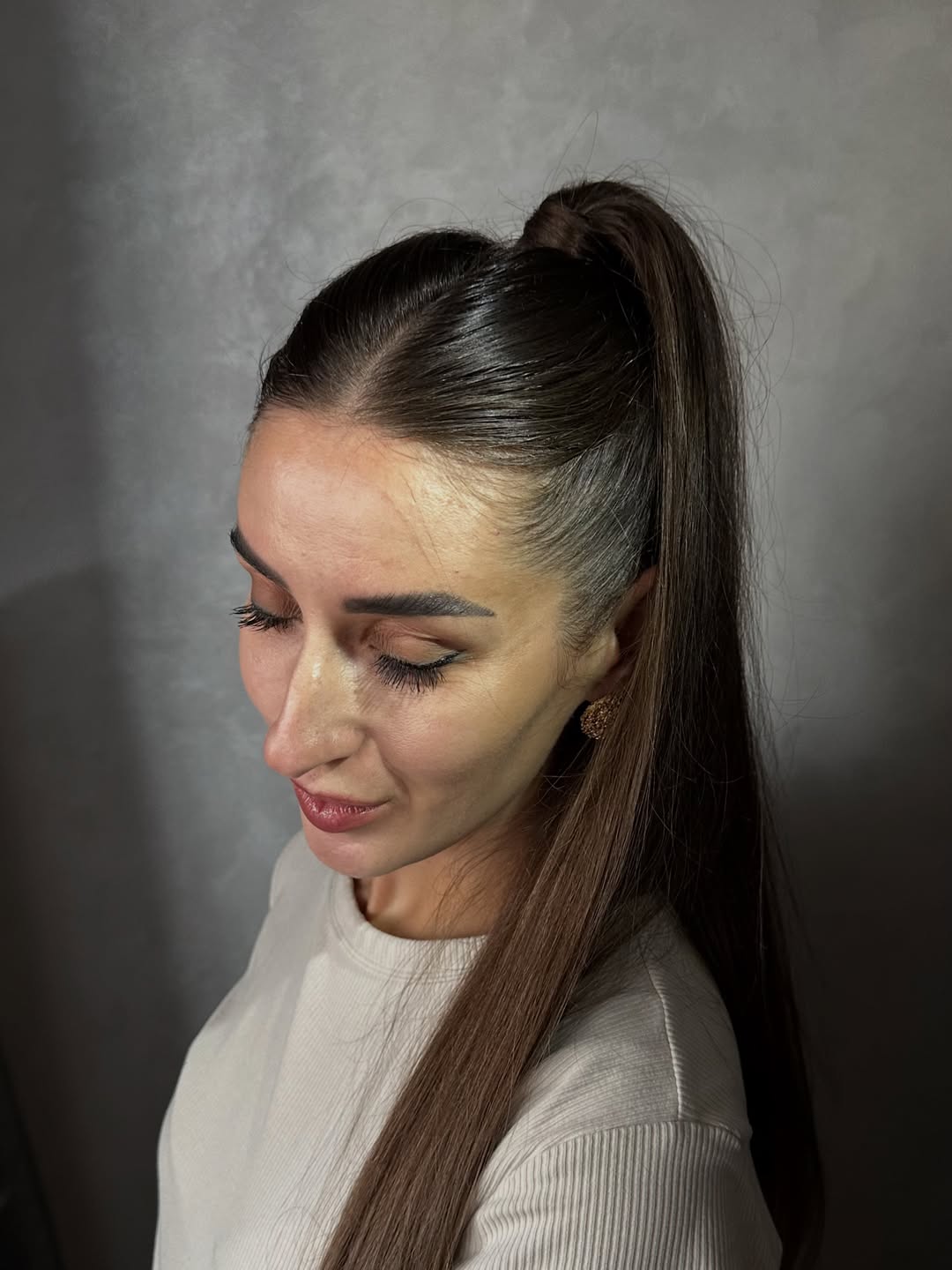 Sleek High Ponytail With Polished Roots
