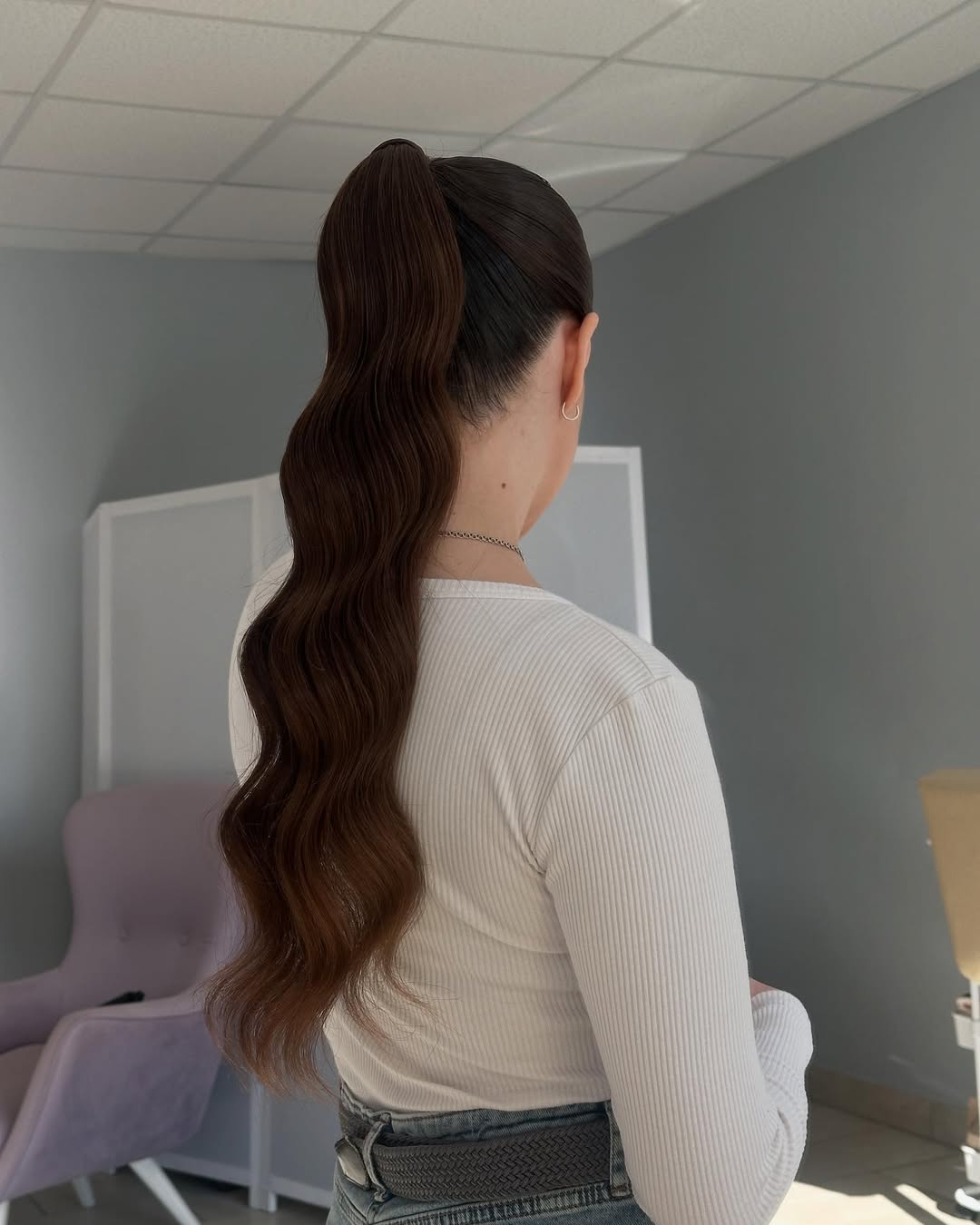 Sleek High Ponytail With Structured Waves