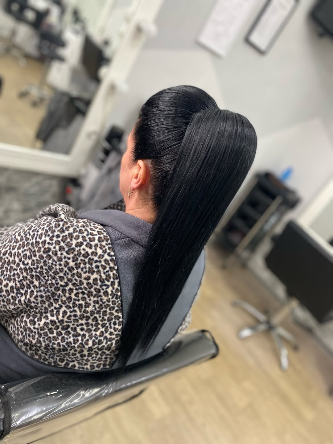 Sleek High Ponytail With Wrapped Base