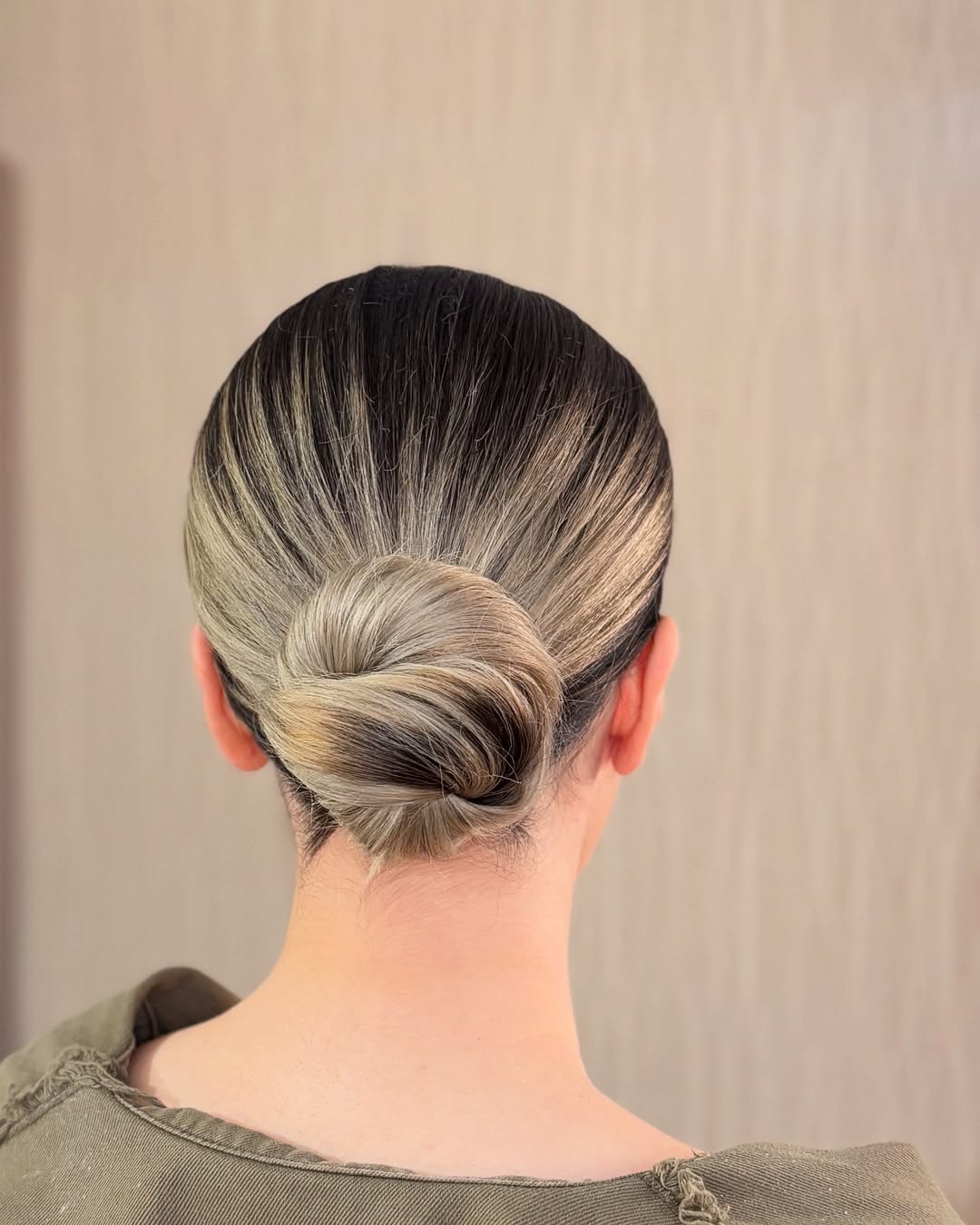 Sleek Low Bun With Ash Blonde Balayage