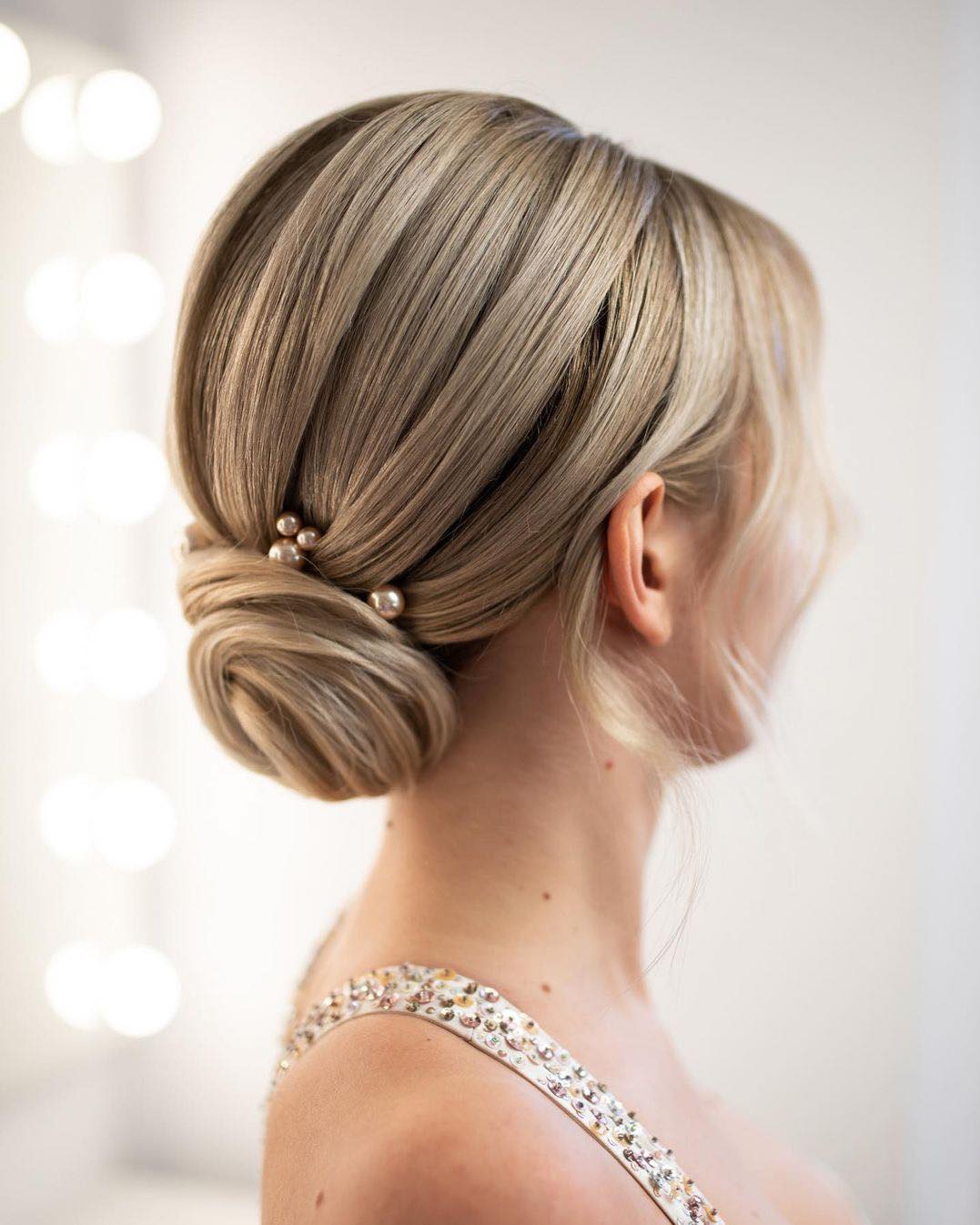 Sleek Low Bun With Pearl Hair Pins