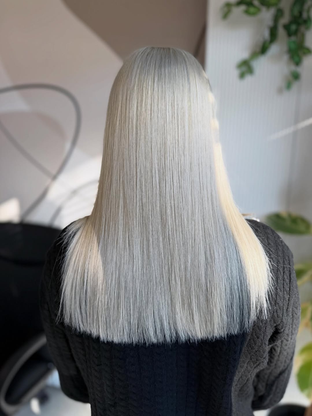 Sleek Platinum Blonde Long Hair With Blunt Cut