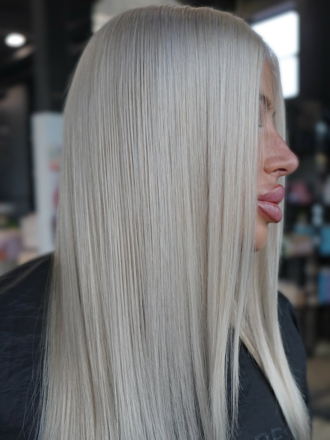Sleek Platinum Blonde Long Straight Hair