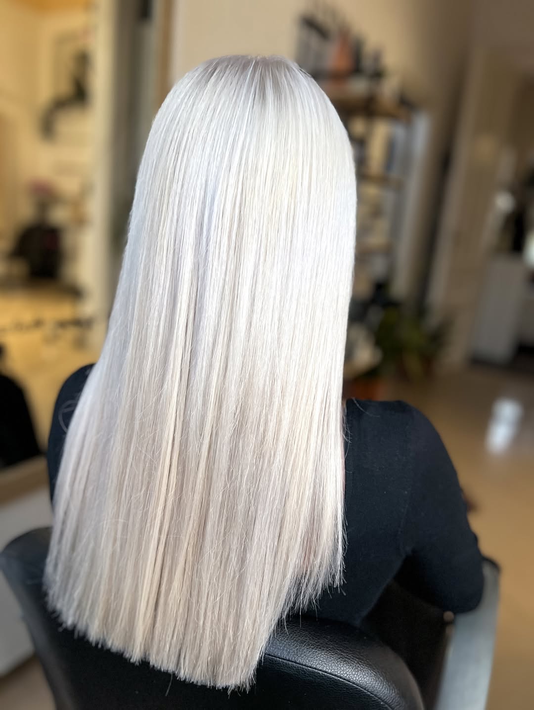 Sleek Platinum Straight Mid-Back Length Hair