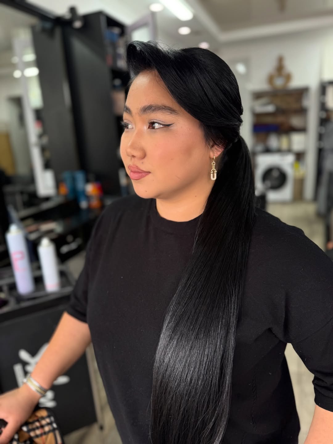 Sleek Side-Swept Jet Black Ponytail