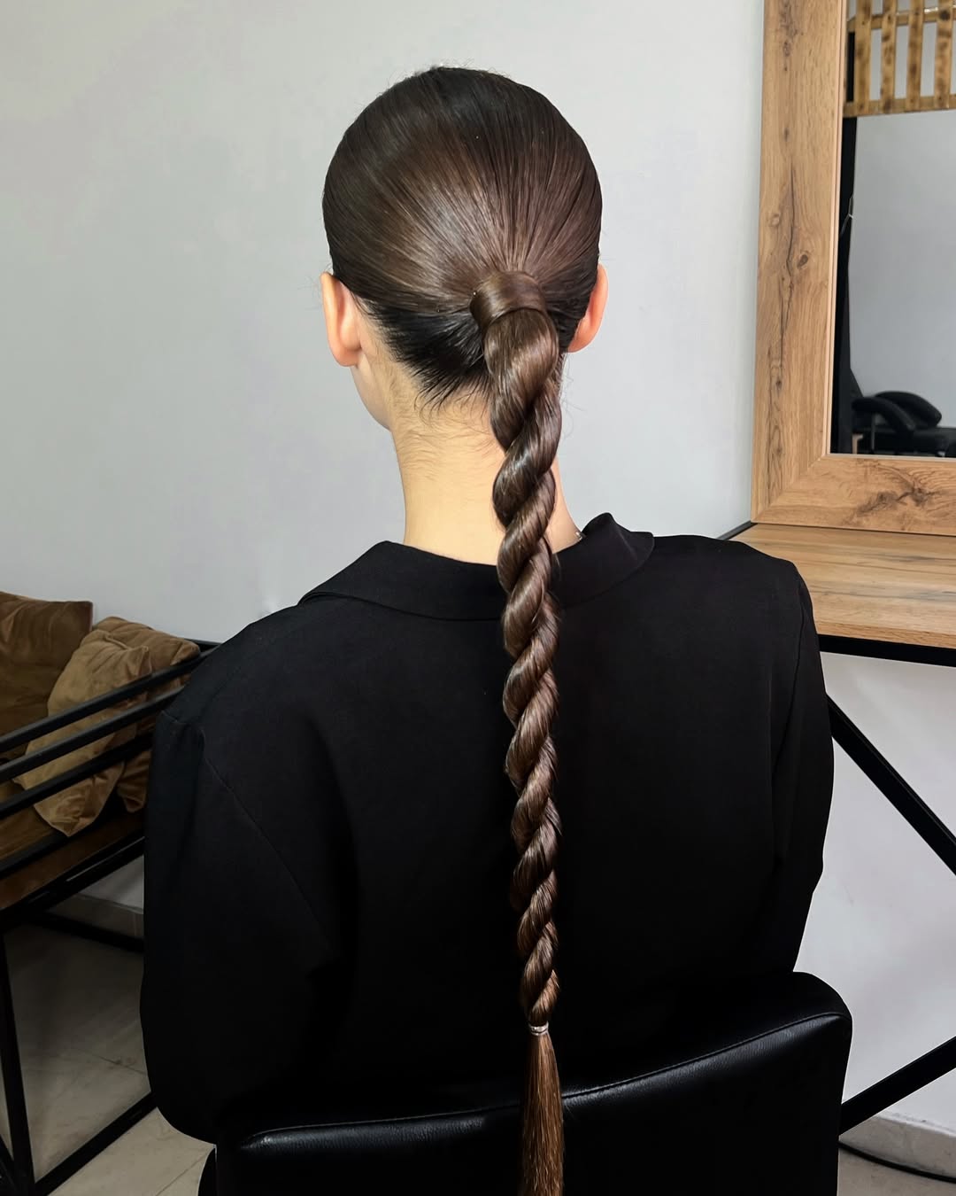 Sleek Twisted Low Ponytail With High Gloss Finish