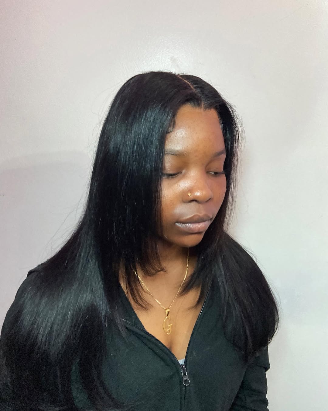 Sleek Waist-Length Black Hair With Subtle Layers