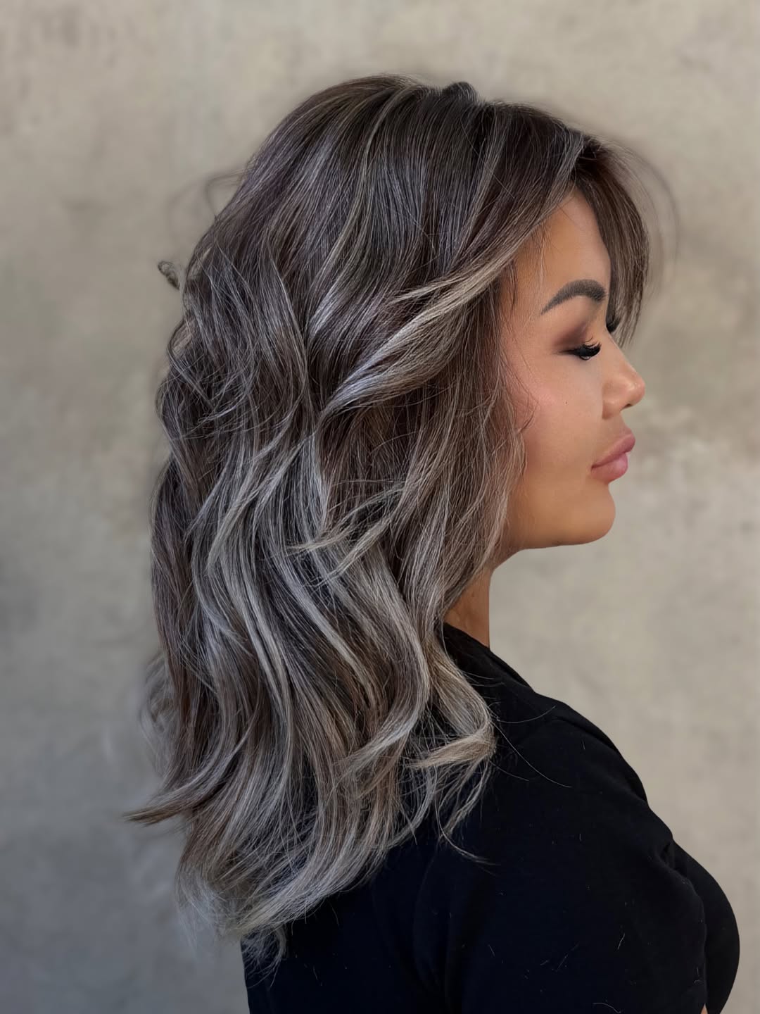 Smoky Ash Blonde Balayage On Brunette Waves