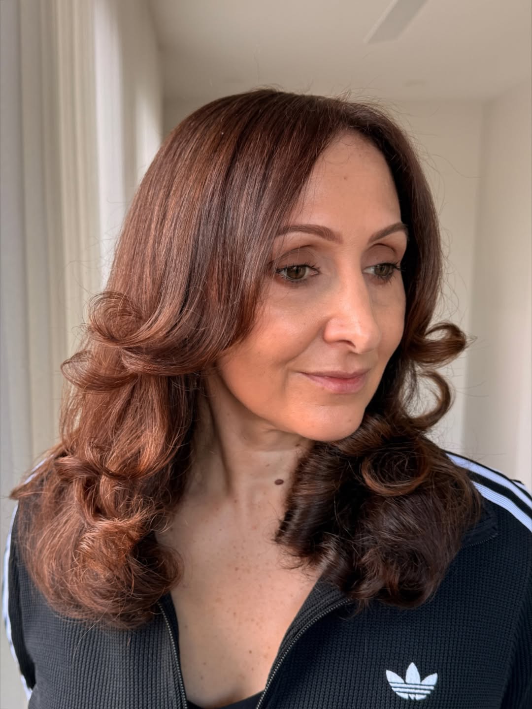 Soft Chestnut Waves With Face Framing Layers