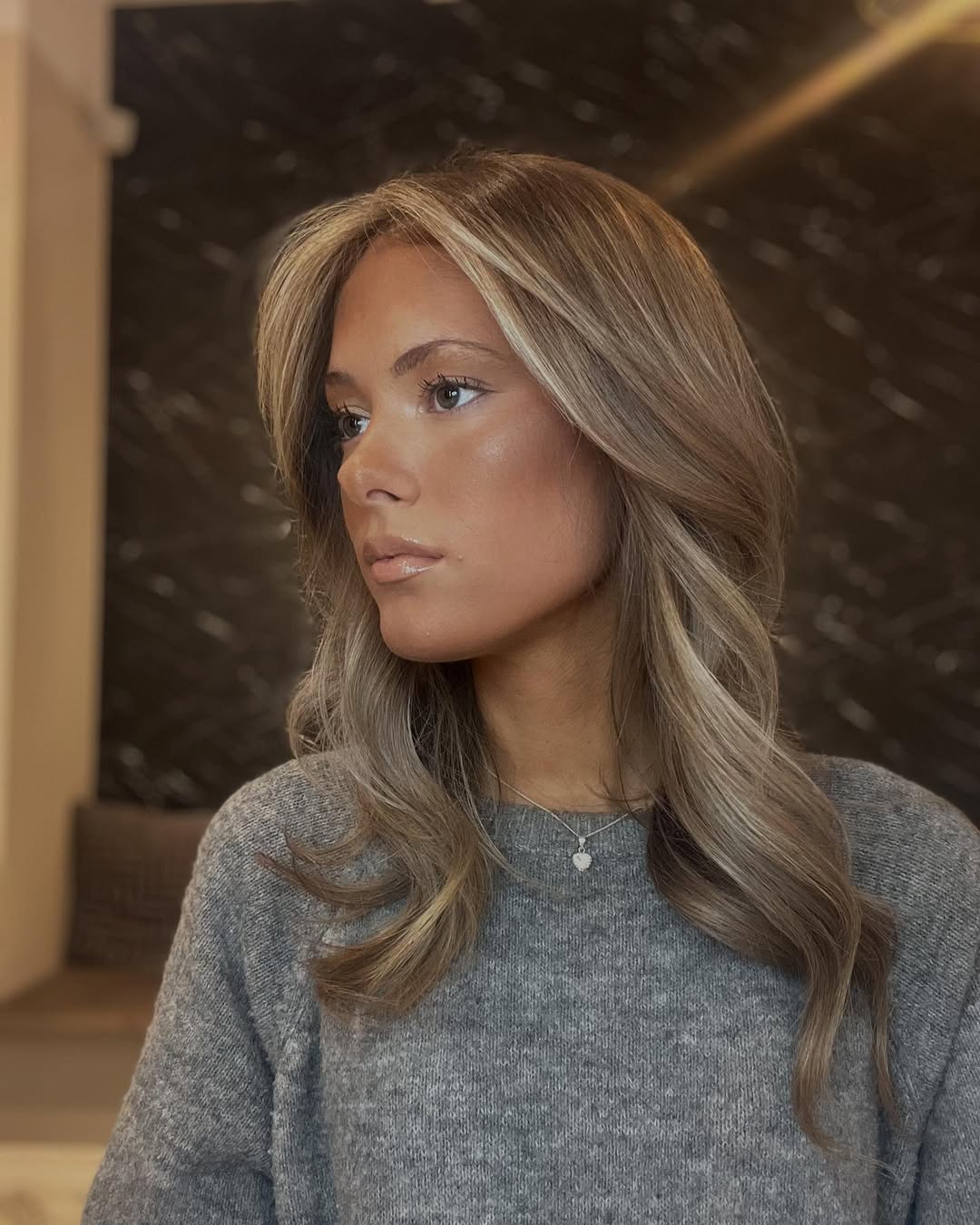 Soft Dark Blonde Waves With Face Framing Layers