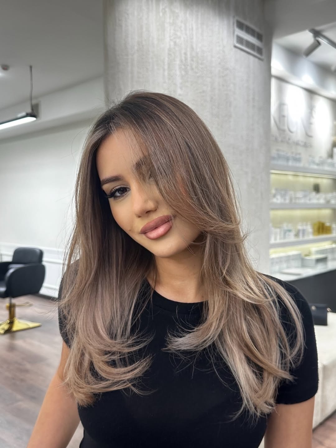 Sophisticated Ash Blonde Balayage with Face Framing Layers