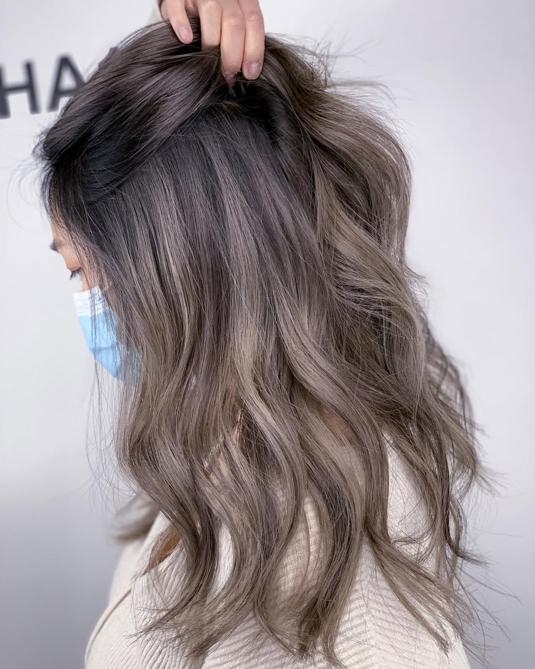 Sophisticated Ash Brown Waves With Dark Roots