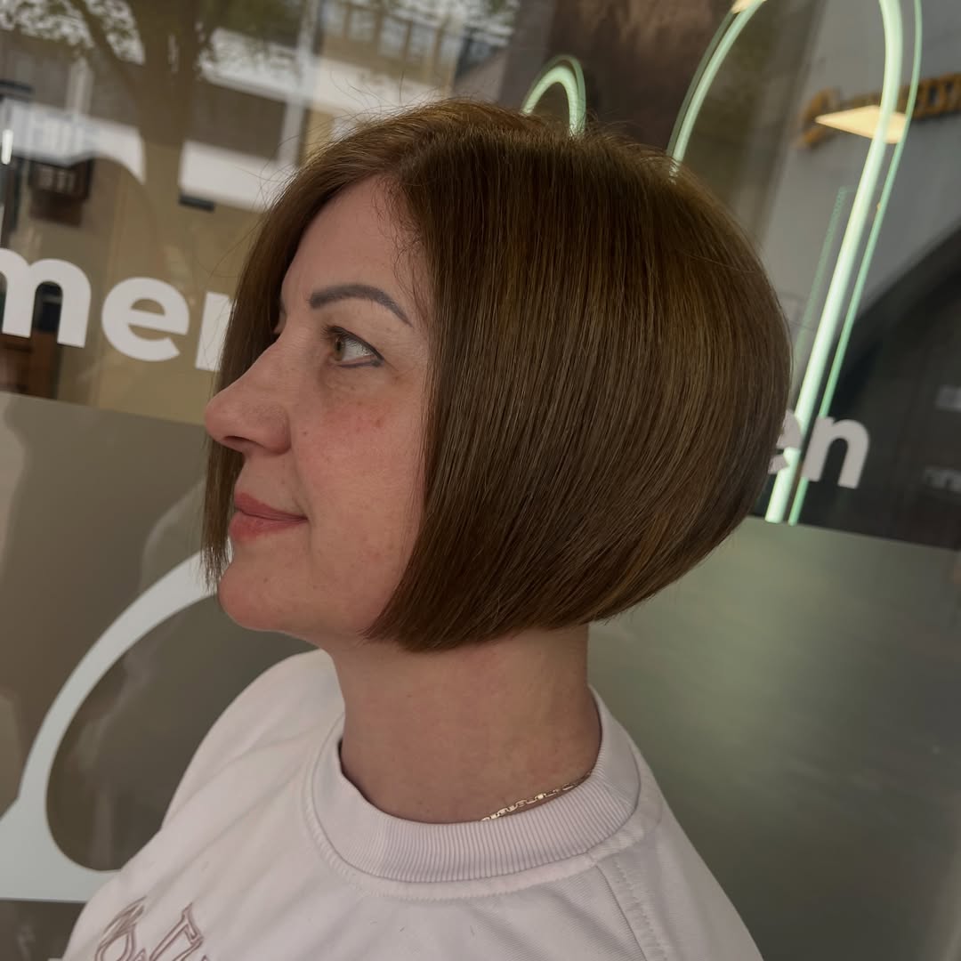 Sophisticated Chestnut Brown Sleek Layered Bob