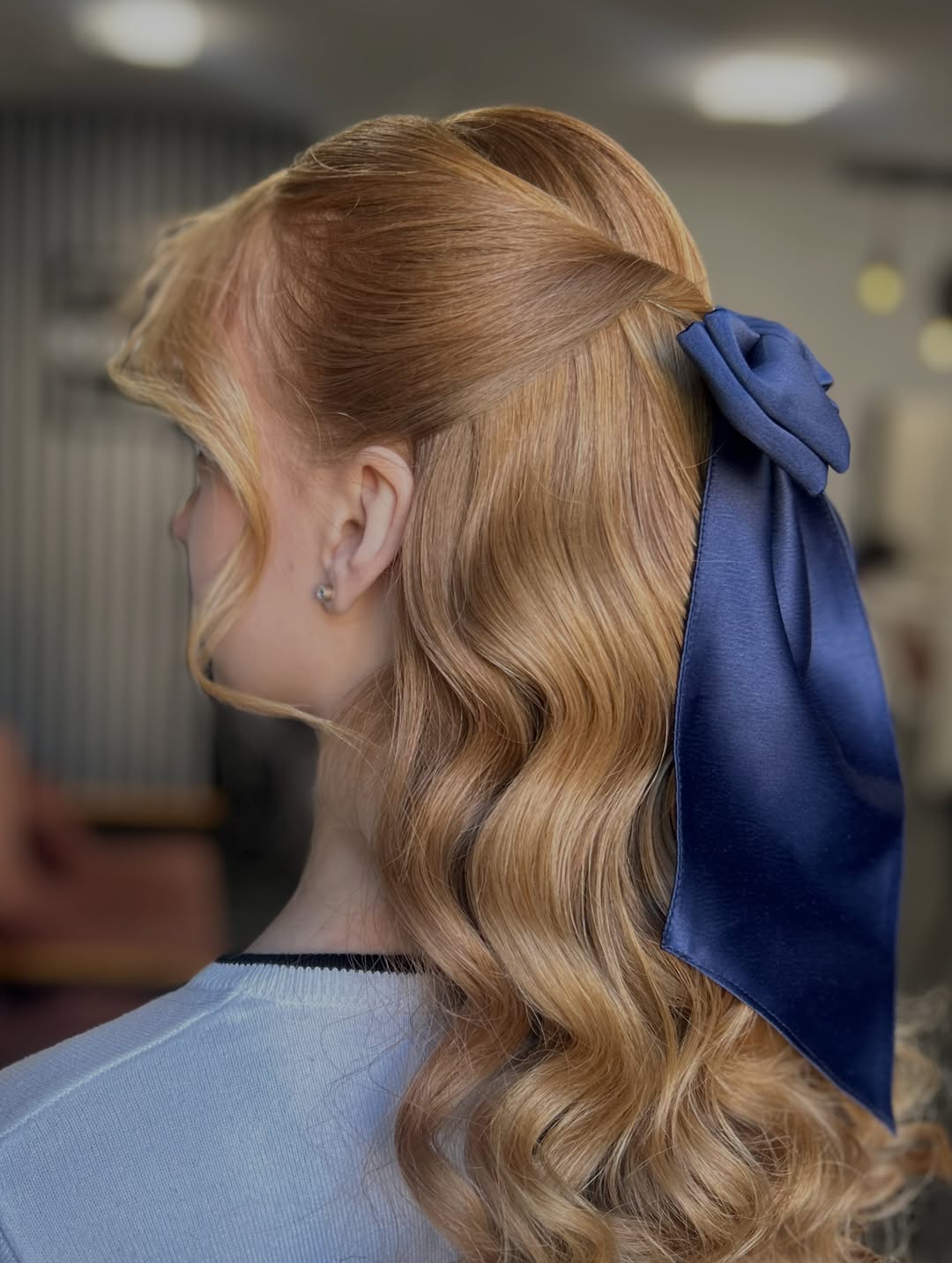 Sophisticated Half-Up Style With Face-Framing Waves