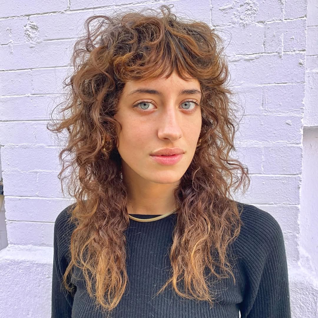 Textured Auburn Shag With Wispy Bangs