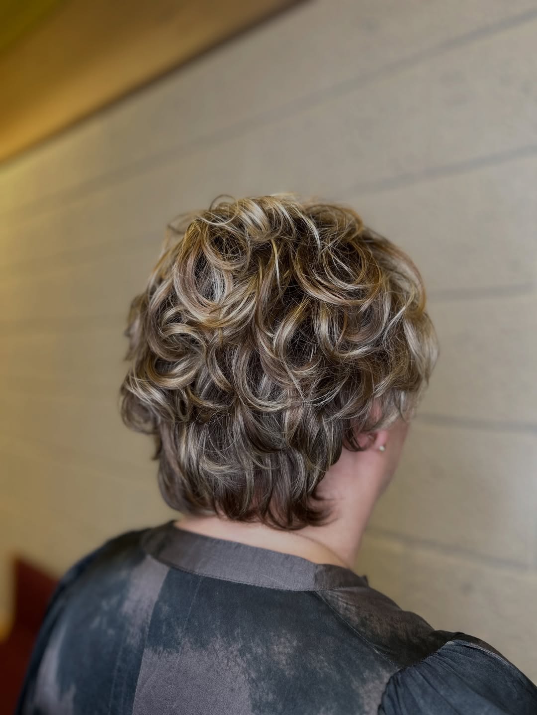 Textured Honey Blonde Curly Pixie Cut