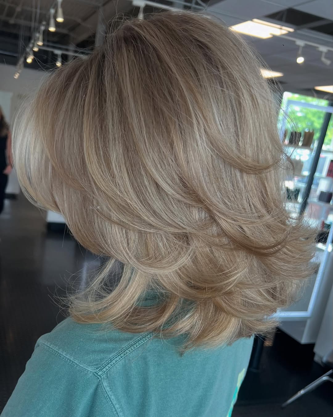Textured Honey Blonde Layered Collarbone Cut