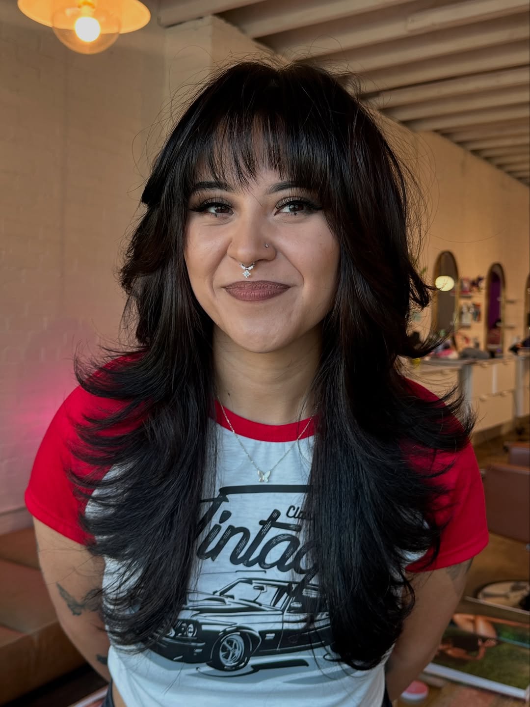 Textured Layers With Wispy Bangs On Dark Hair