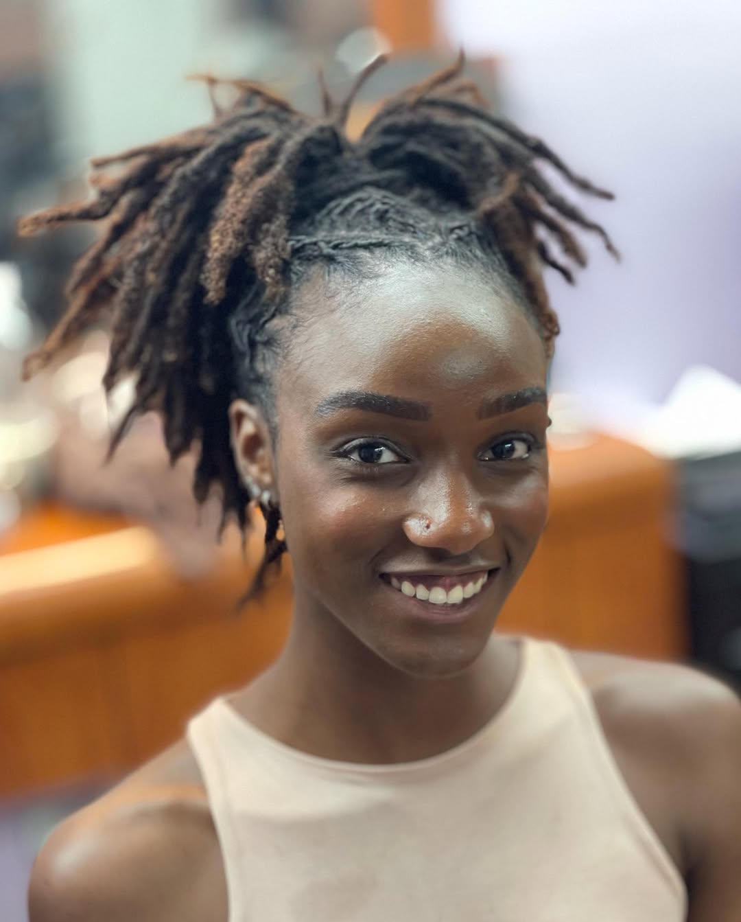 Textured Loc Updo With Caramel Highlights
