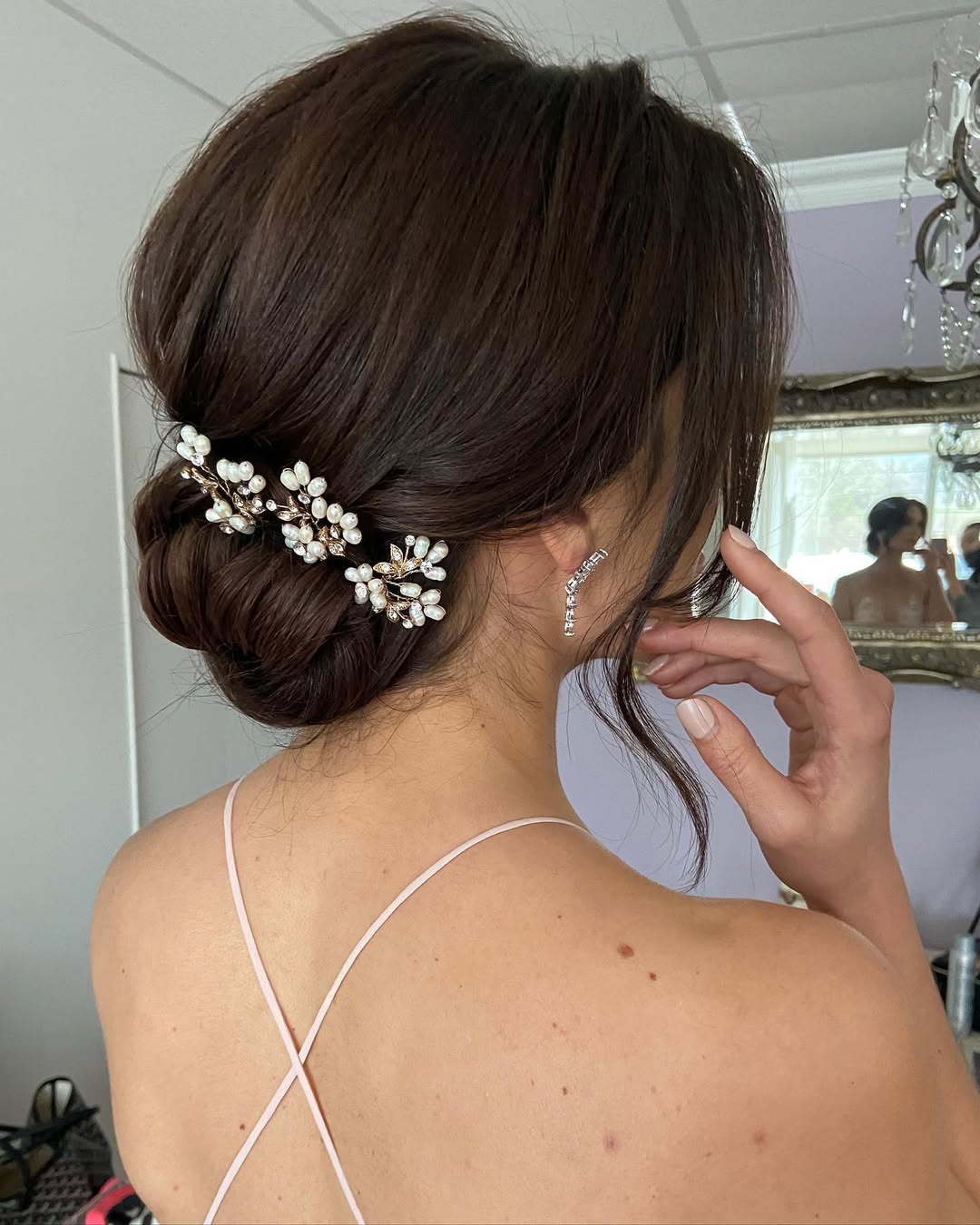 Textured Low Bun With Delicate Pearl Accessory