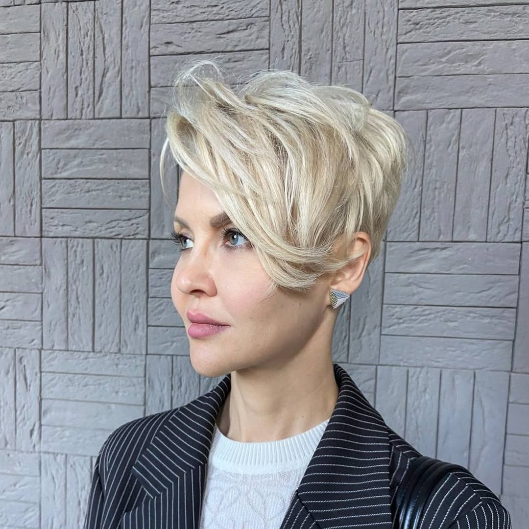 Textured Platinum Blonde Pixie With Asymmetrical Bangs