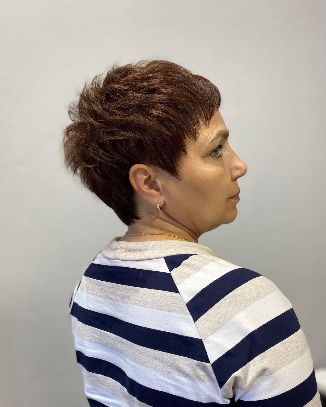 Textured Tousled Pixie With Subtle Auburn Highlights