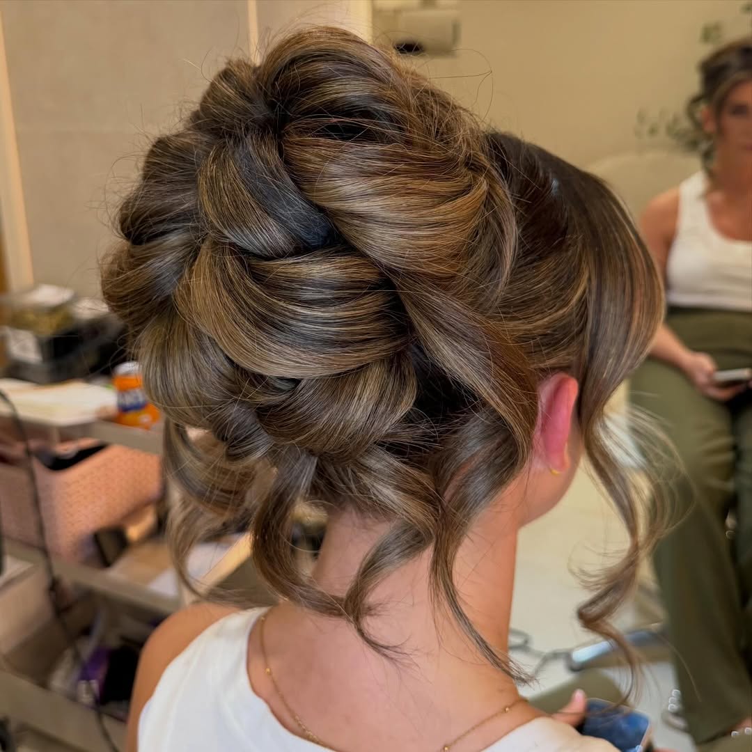 Textured Updo With Face Framing Tendrils
