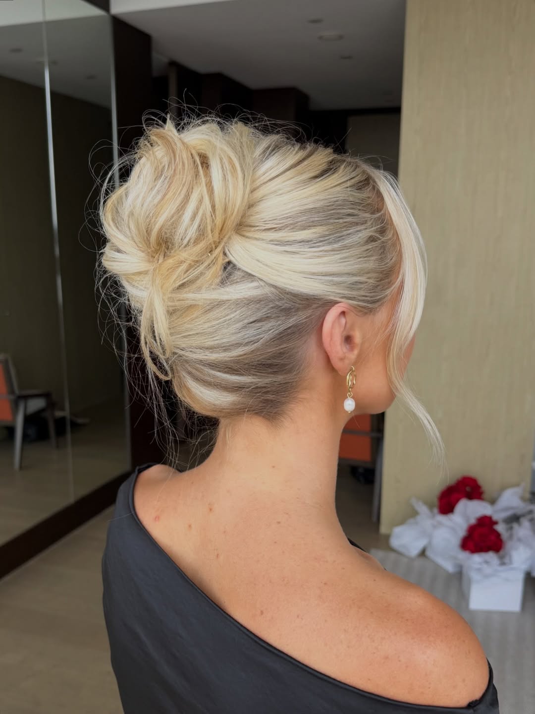 Textured Updo With Face-Framing Tendrils