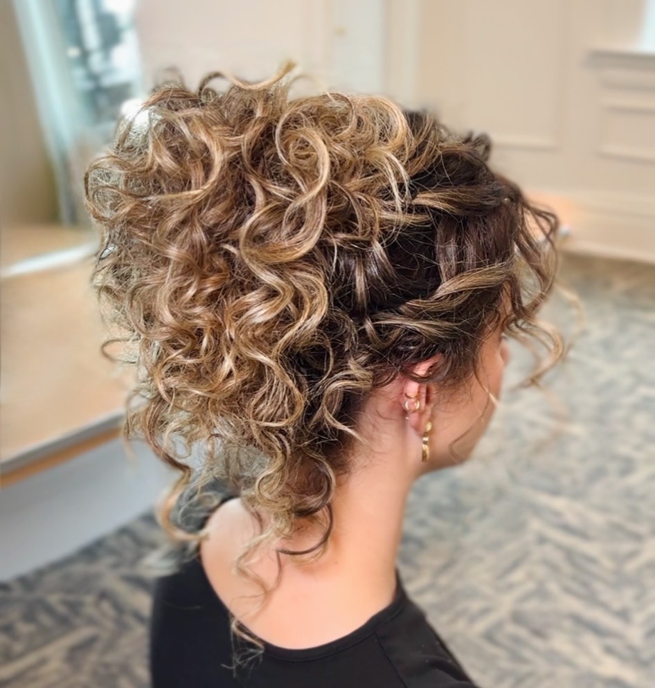 Tousled Curly Updo With Honey Blonde Highlights