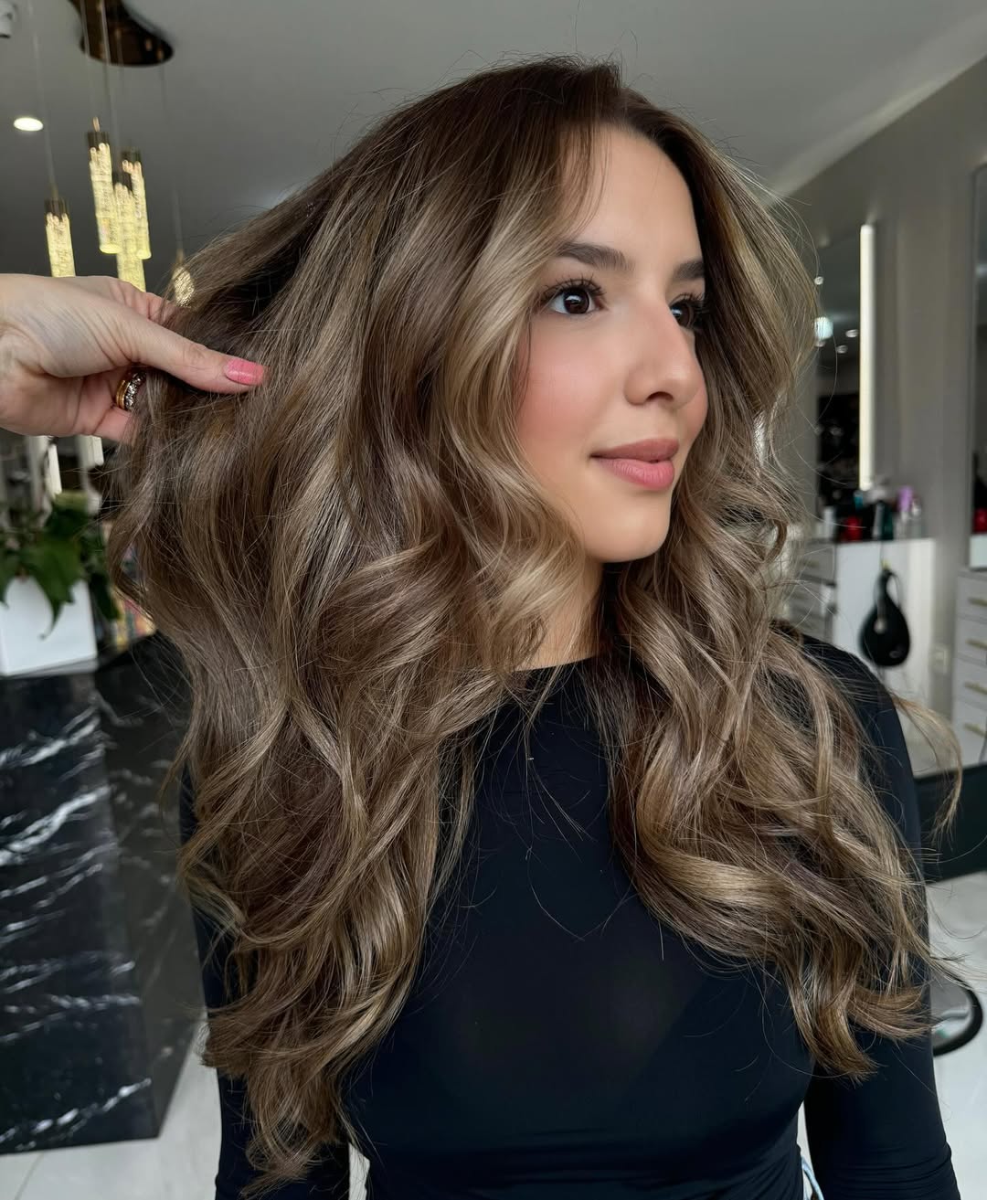 Tousled Dark Blonde Waves With Subtle Dimension