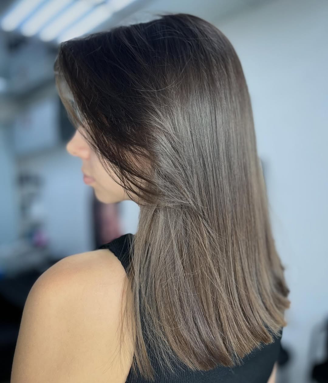 Trendy Dark Ash Blonde With Soft Face Framing Layers